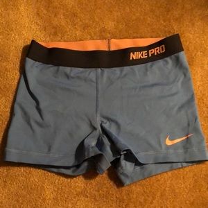 Baby blue and pink nike pro spandex